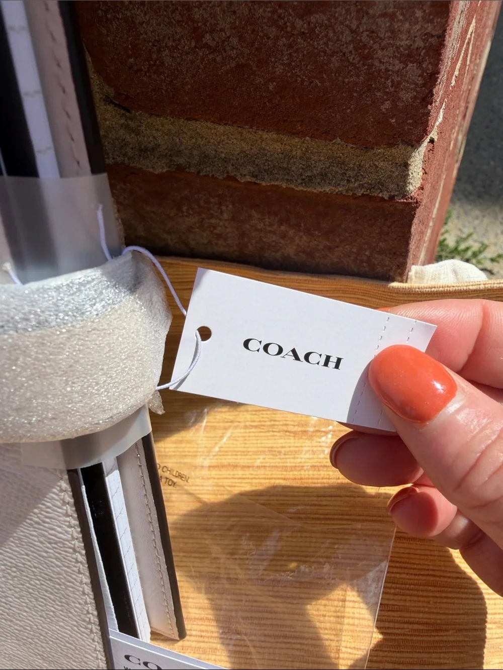 Coach Cream Signature Leather Agenda with Snap Strap Chuck and white color